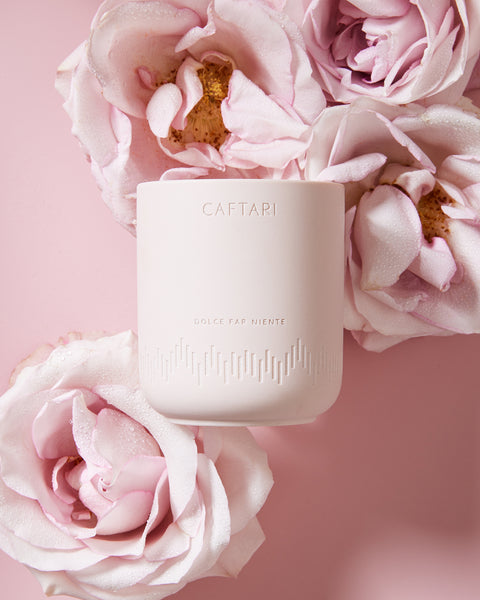 Dolce Far Niente essential oil candle rose scent for happiness overhead photo