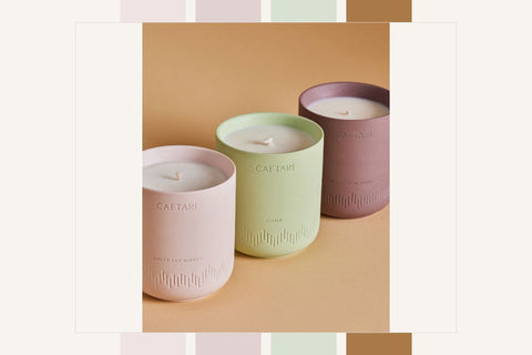 Caftari clean candle lineup in brand colors